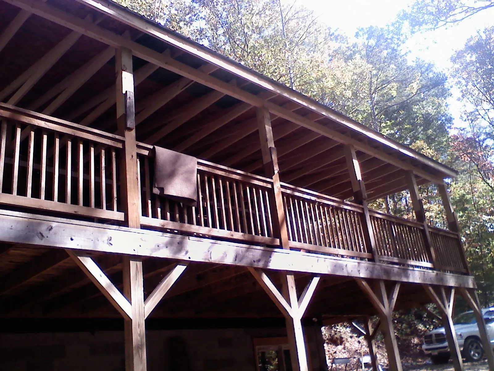 Timber framing under a new elevated porch and deck — Roof Leak Repair in Goddard by Roofing Brothers